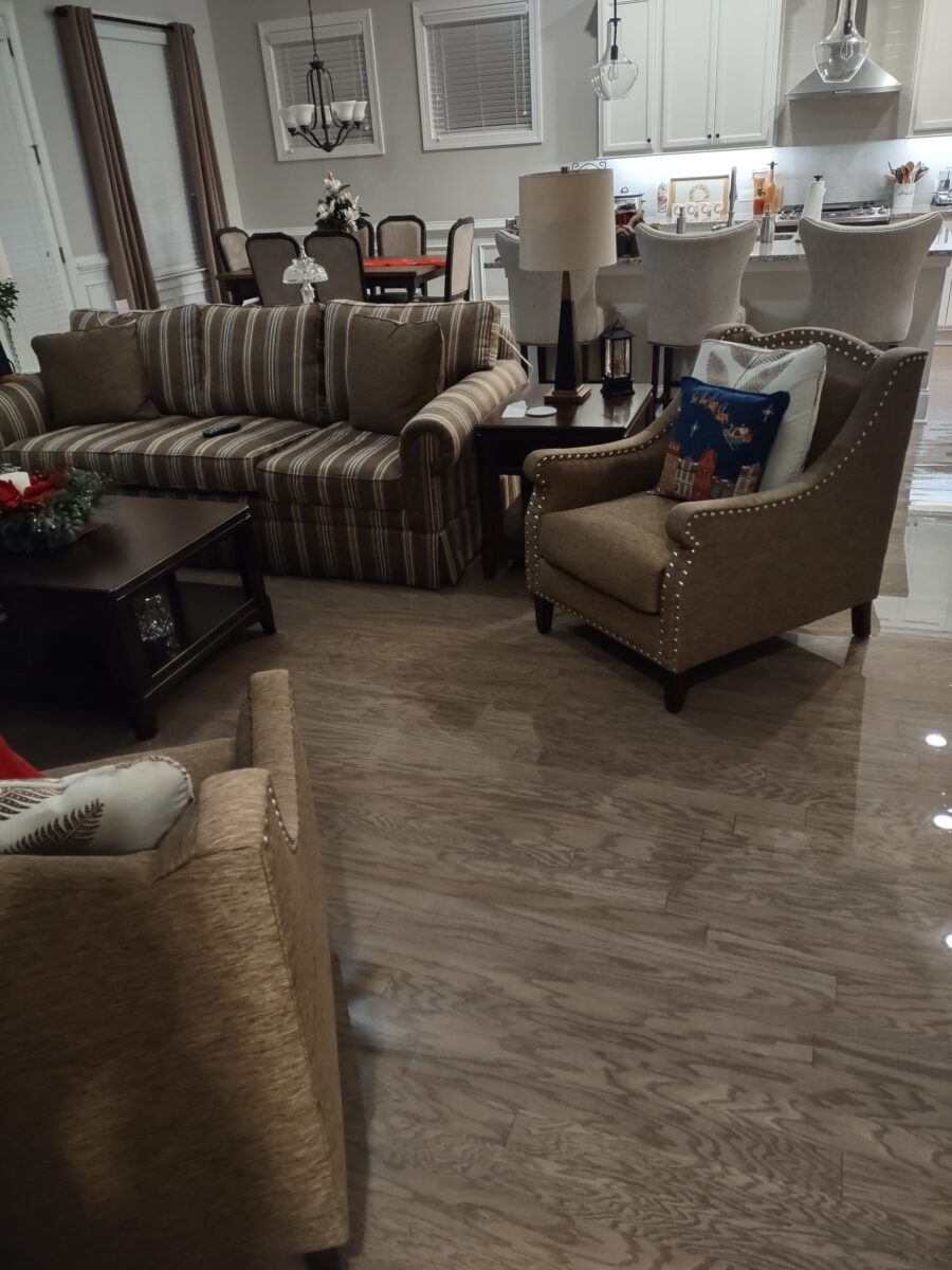 Air movers and fans positioned throughout room for moisture removal