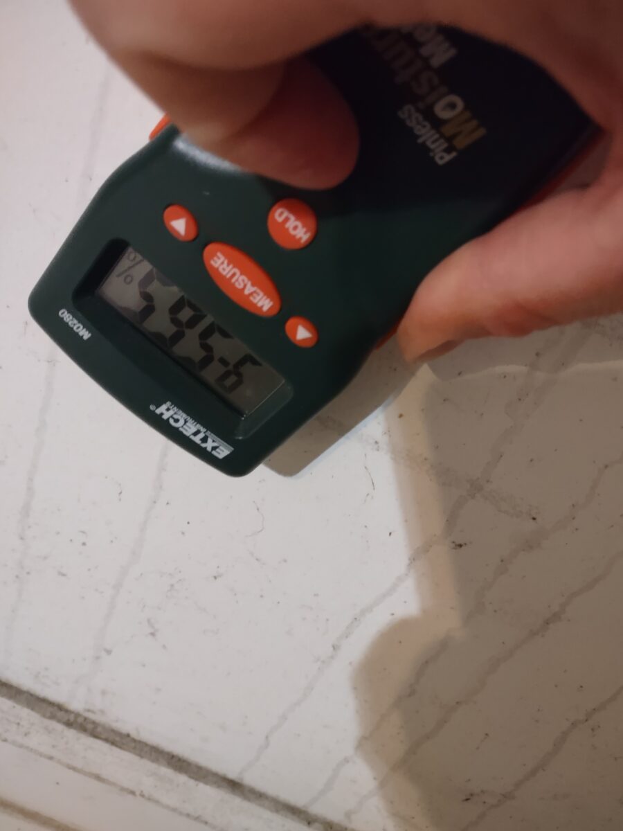 Newly remediated crawl space showing clean foundation, installed vapor barrier, dehumidifier, and proper ventilation in Marietta home.