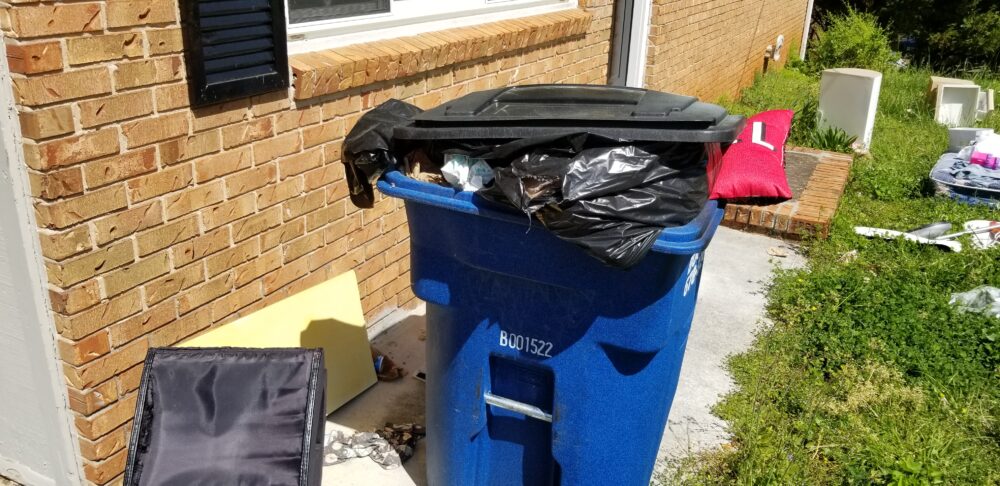 Licensed odor removal team inspecting and treating Marietta GA residential property