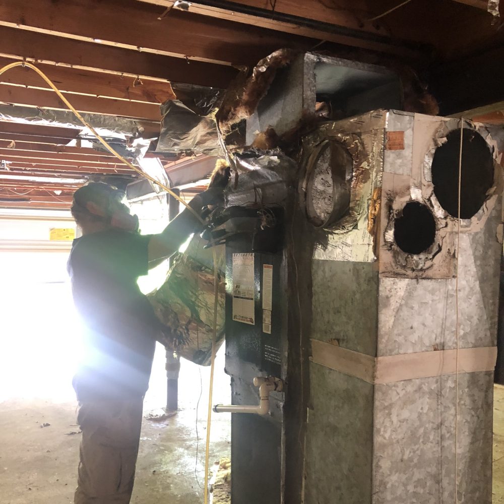 Professional hazmat technician performing tear gas cleanup in Marietta GA property