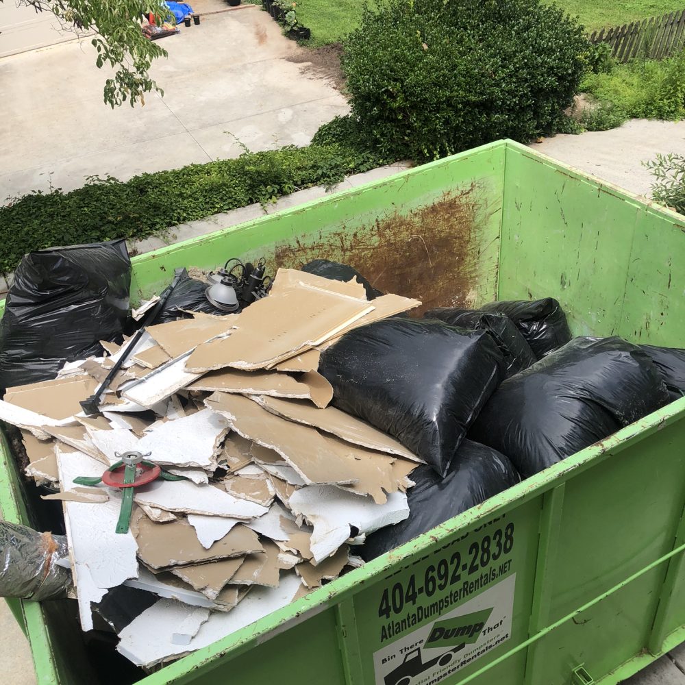 Professional odor removal technician treating indoor air quality issues in Marietta GA property